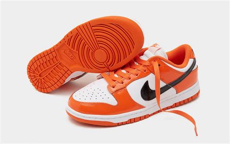 orange black and white dunks